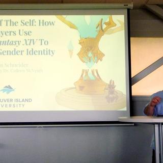 Kevin presenting on Honours research.